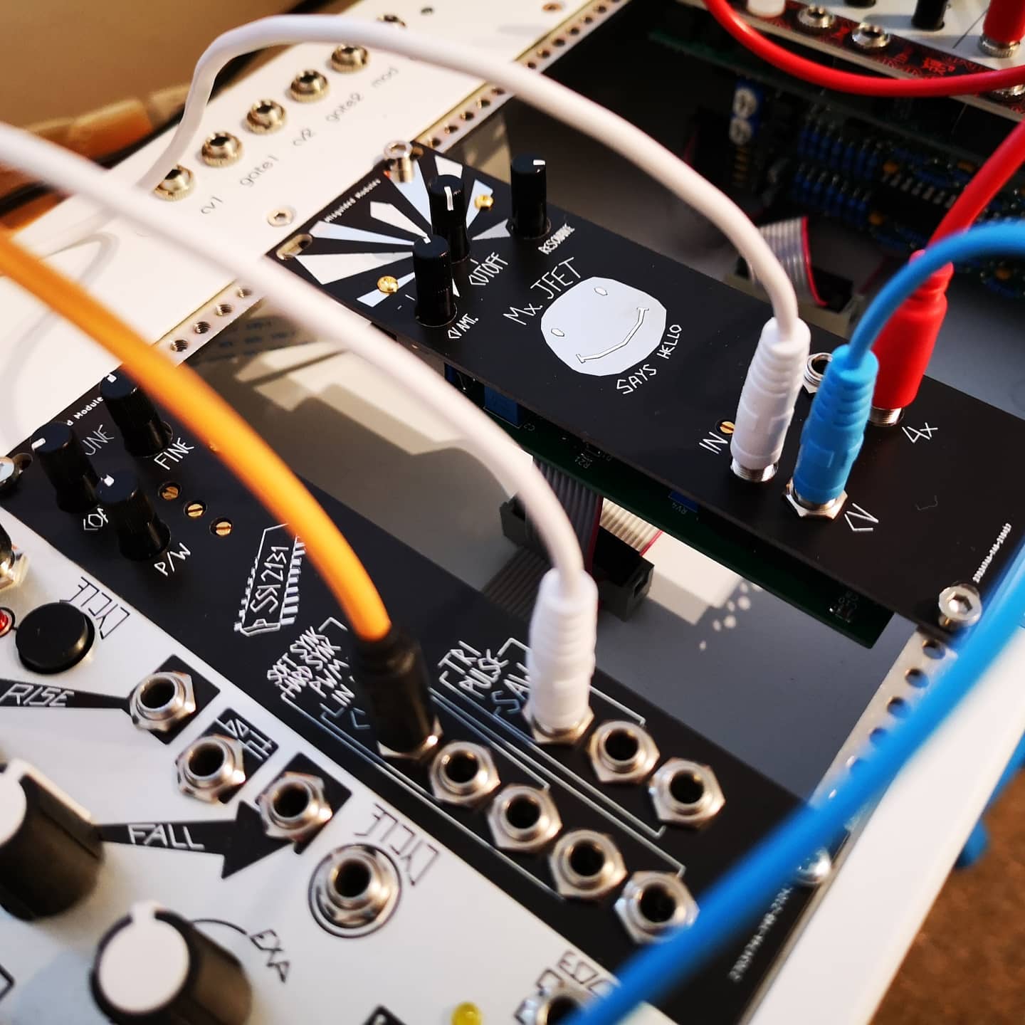 Photo of a SSI2131 VCO in my rack, next to a prototype JFET-based filter